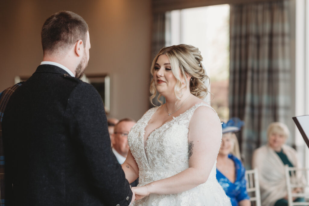 Bride at Meldrum house, exchanging vows 