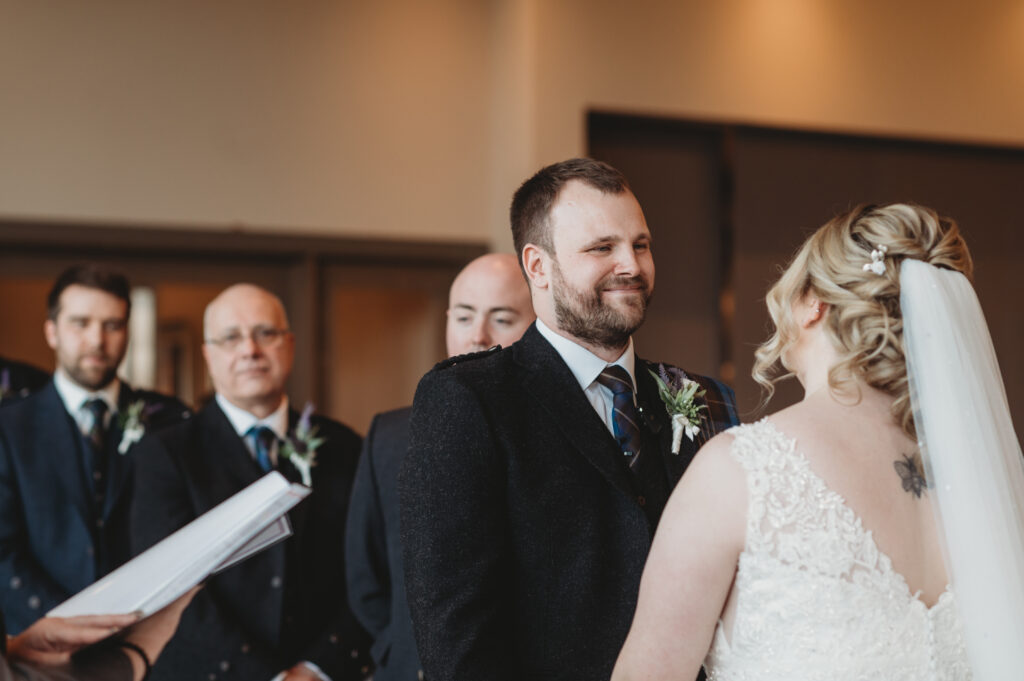 Groom at Meldrum house, exchanging vows 