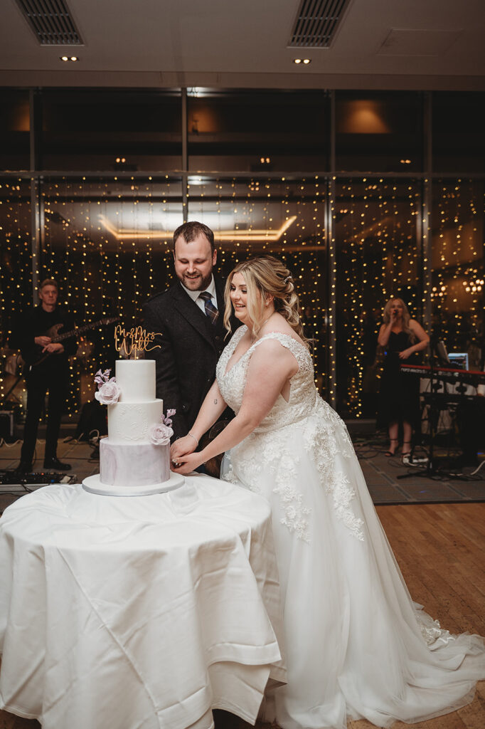 Cake cutting at aberdeenshire wedding venue meldrum house 