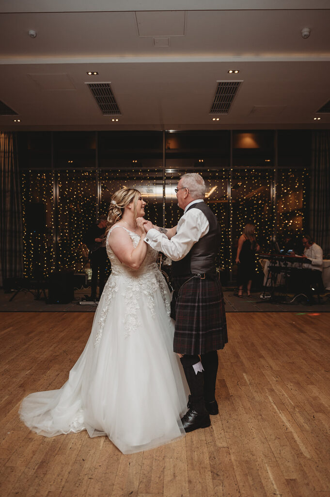 FAther daughter dance during Evening reception at meldrum house, 