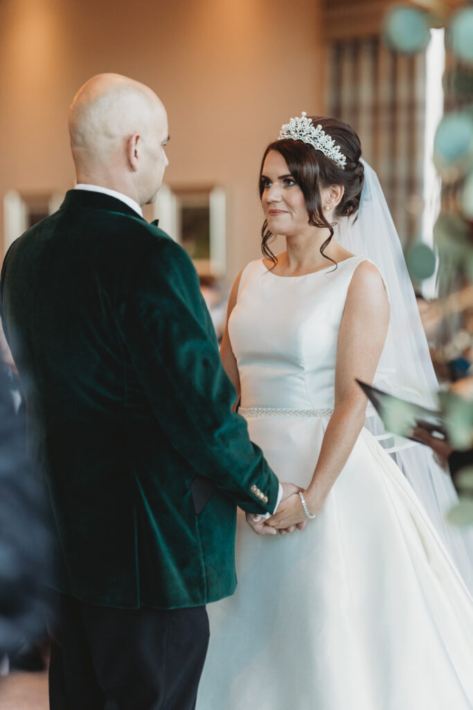 Aberdeenshire couple at meldrum house exchanging vows
