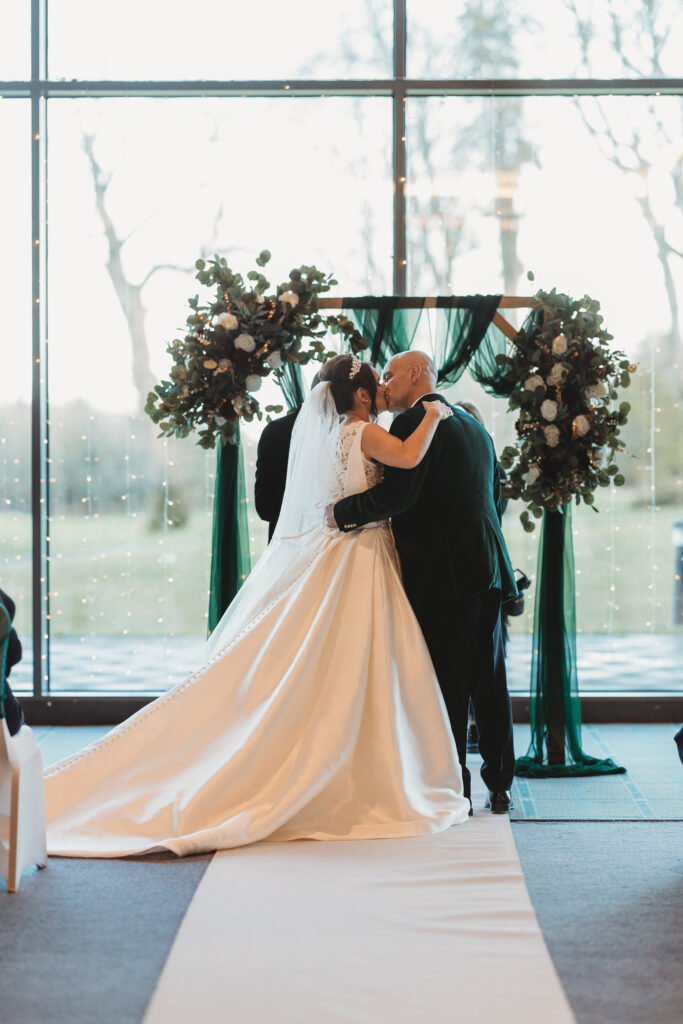 Aberdeenshire bride and groom first kiss at meldrum house aberdeenshire