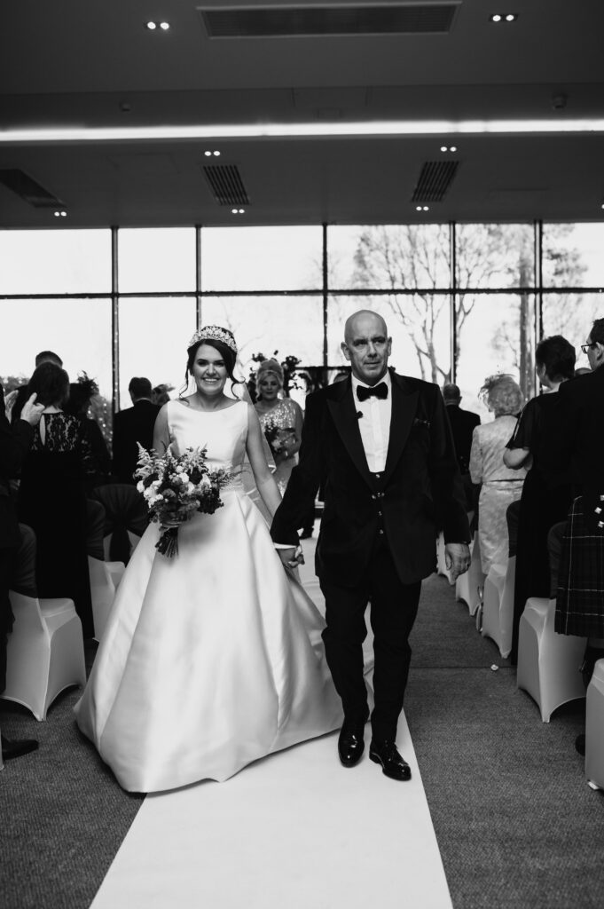 Aberdeenshire couple photographed during their wedding ceremony at meldrum house