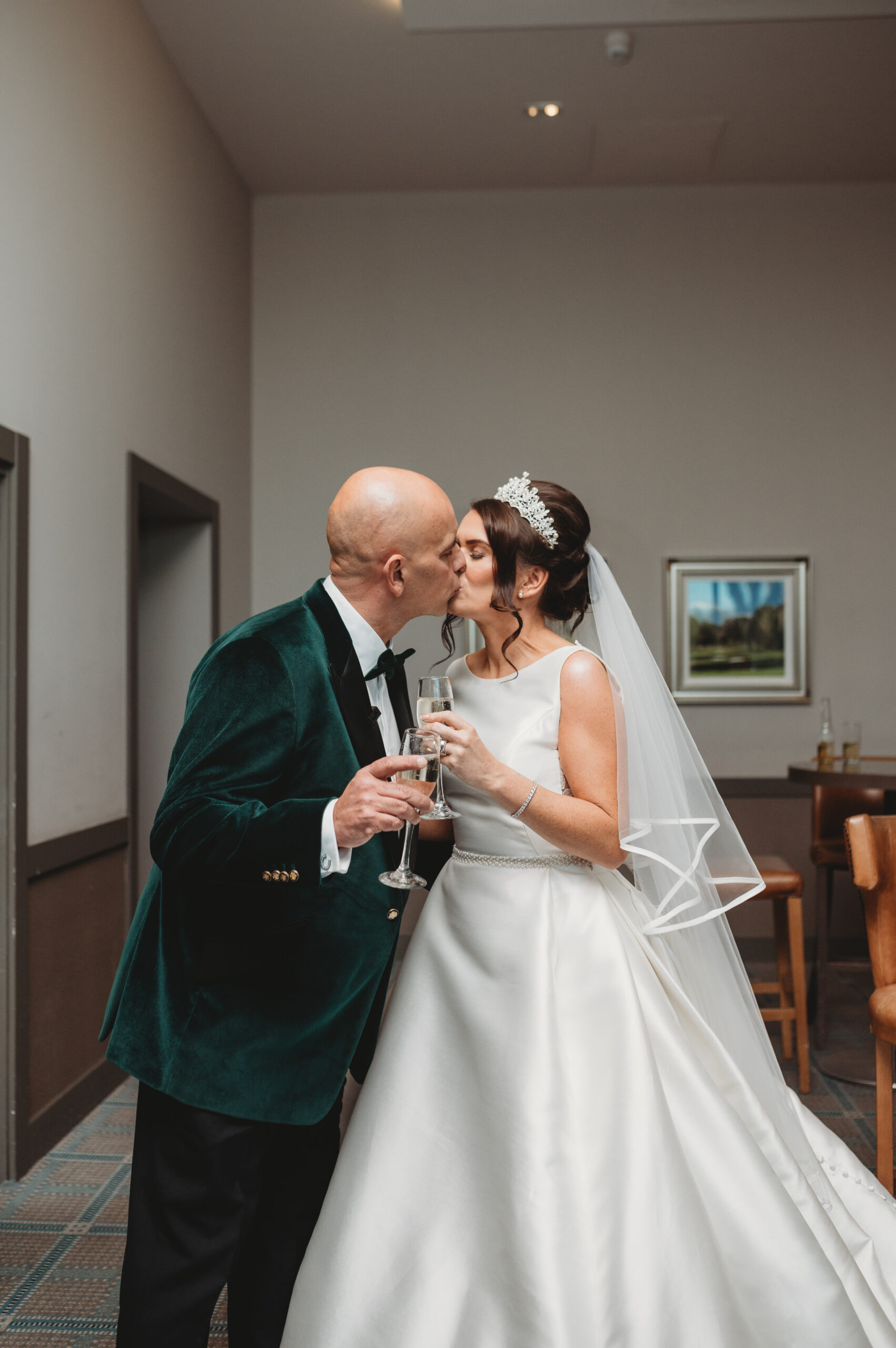 Aberdeenshire newlyweds toast after their wedding ceremony at meldrum house