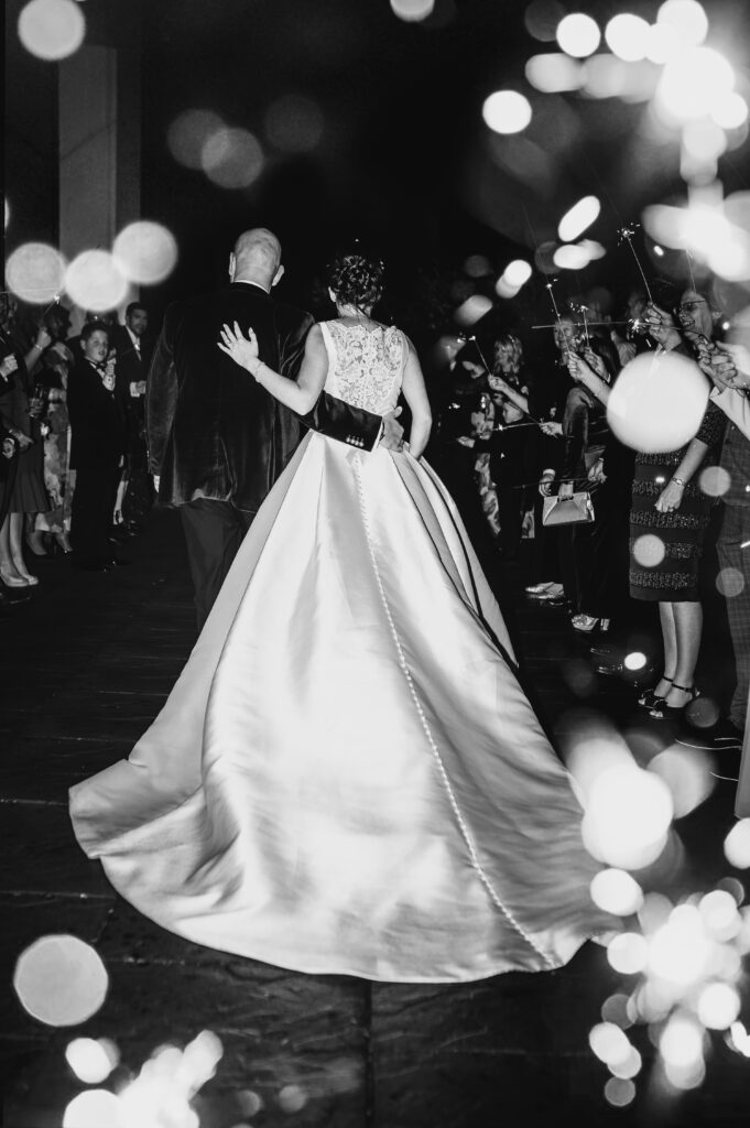 Aberdeenshire couple photographed during a sparkler send-off by an aberdeenshire wedding photographer at meldrum house