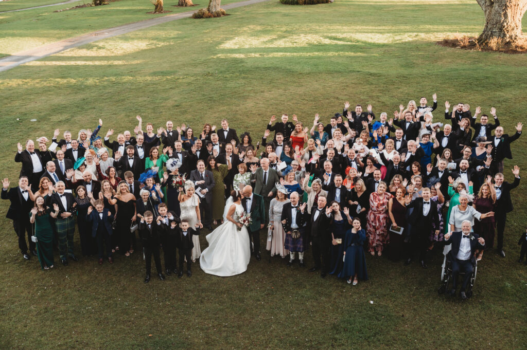 Wedding guests photographed on aberdeenshire wedding venue meldrum house during aberdeenshire wedding