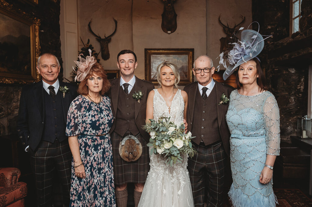 Aberdeenshire wedding photographer captures wedding family photo at Maryculter House