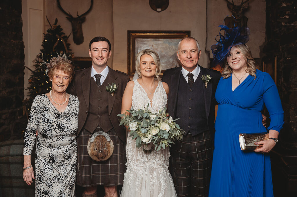 Aberdeenshire wedding photographer captures wedding family photo at Maryculter House