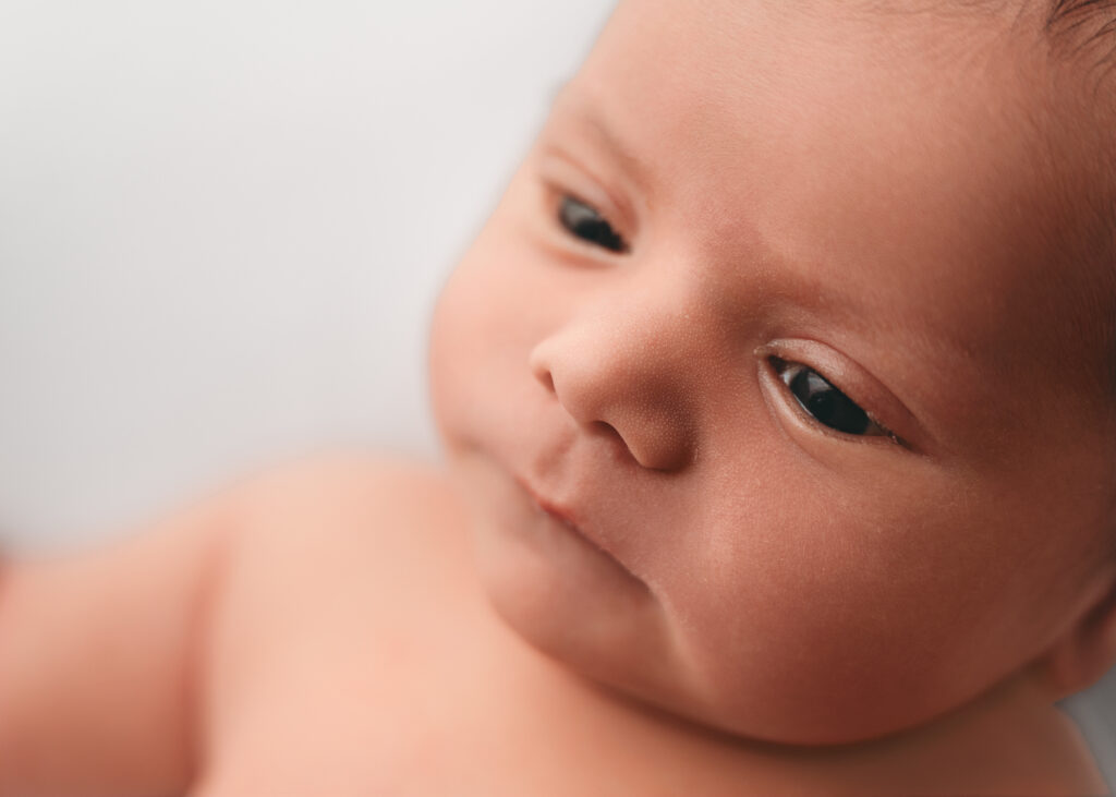Close-up shot of the baby's skin during a newborn session in Aberdeenshire