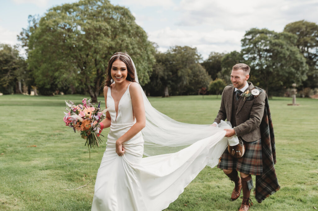 Aberdeenshire wedding photographer captures couple at Pittodrie House wedding